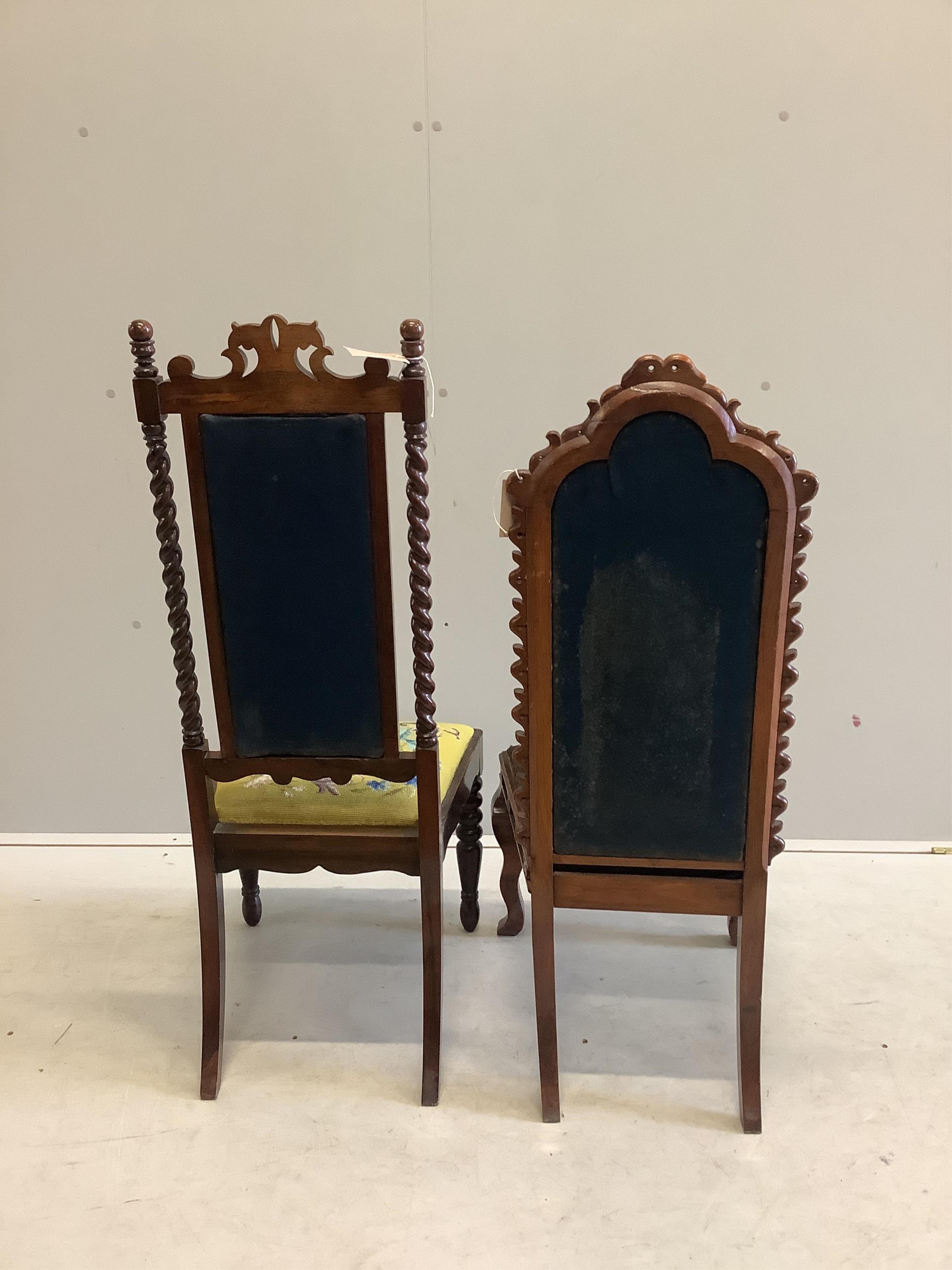 A Victorian Gothic style carved walnut frame hall chair and a similar rosewood frame chair, larger width height 104cm. Condition - fair